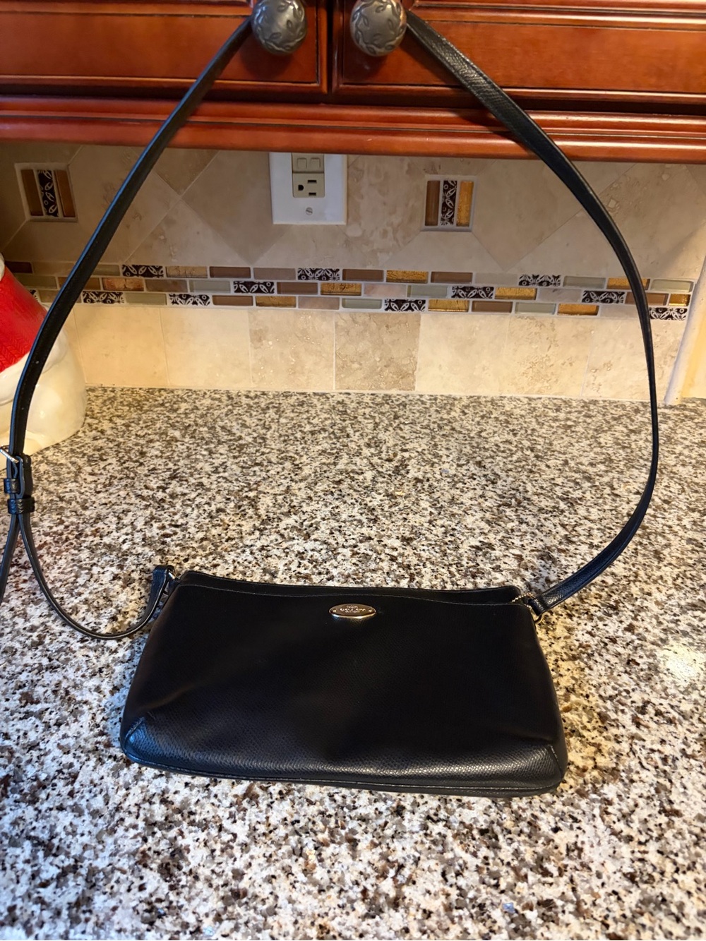 Coach Black Leather Shoulder Bag with Gold Logo